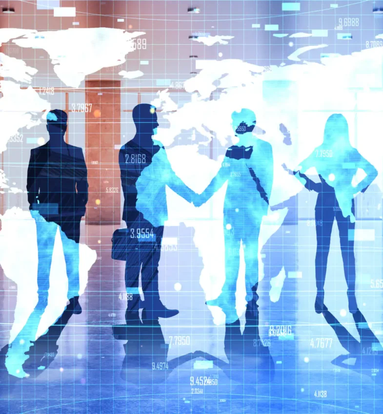 Silhouettes of business professionals standing and shaking hands against a blue illuminated digital world map with data graphics, representing global law enforcement and fraud prevention collaboration.
