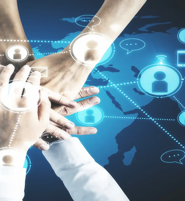 Several hands stacked together in unity and teamwork overlaid with digital network connections, communication icons, and a global map, representing scam victim advocacy and collaborative support.